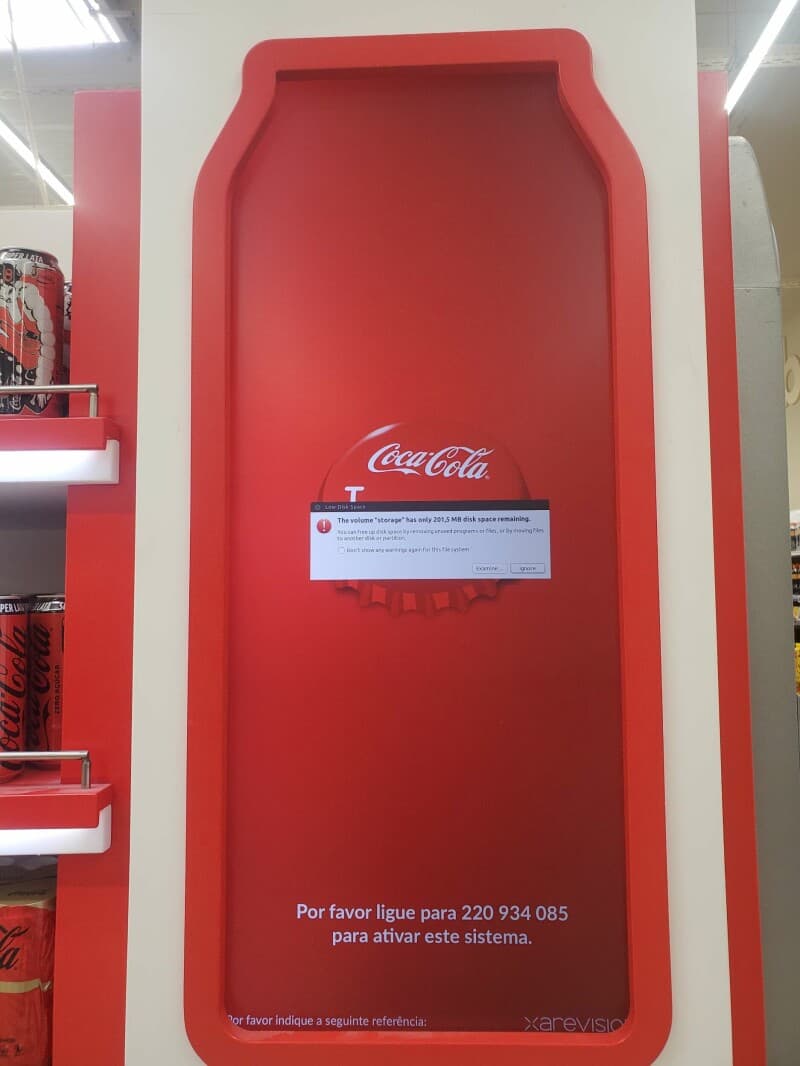 Digital indigestion: Fizzy Coca-Cola display chokes on full storage