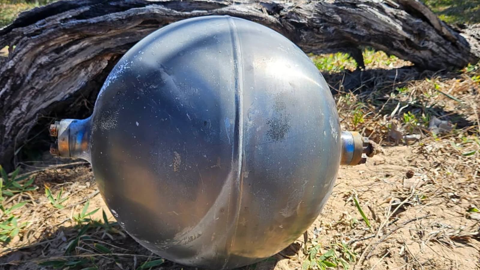 Metal balls from space are popping up on Australia's beaches